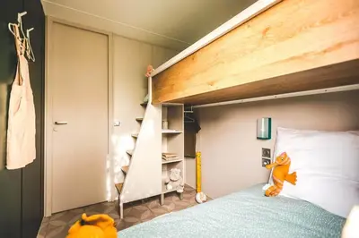 Un ou plusieurs lits dans un hébergement de l'établissement Camping Country Park Crecy La Chapelle - Site Officiel - Next to Disneyland Paris
