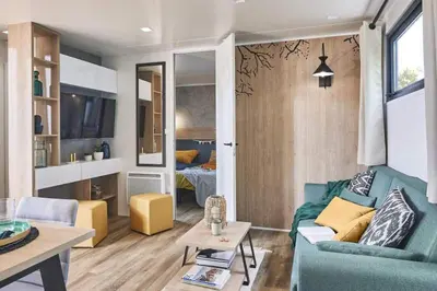 Coin salon dans l'établissement Camping Country Park Crecy La Chapelle - Site Officiel - Next to Disneyland Paris