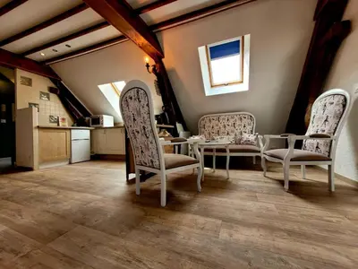 Coin salon dans l'établissement Au 1894 Loft