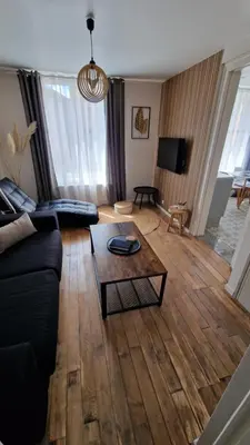 Télévision ou salle de divertissement dans l'établissement La Symphonie