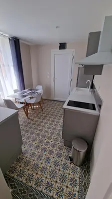 Cuisine ou kitchenette dans l'établissement La Symphonie