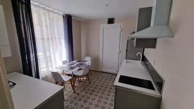 Cuisine ou kitchenette dans l'établissement La Symphonie