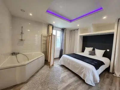 Un ou plusieurs lits dans un hébergement de l'établissement Appartement avec baignoire - Hautvillers