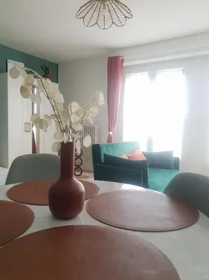 Coin salon dans l'établissement Le Cosy du Faux Bourg