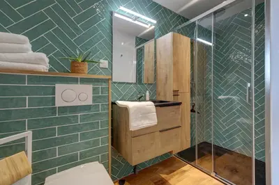 Salle de bains dans l'établissement Un nid dans la Grange - Maison avec jacuzzi et sauna