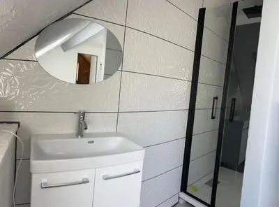 Salle de bains dans l'établissement CHEZ BRIGITTE