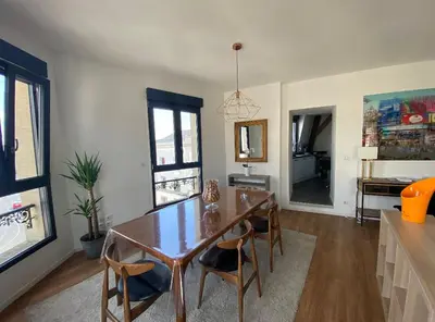 Télévision ou salle de divertissement dans l'établissement Millésime magnifique appart centre Epernay