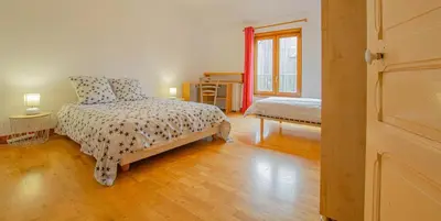 Un ou plusieurs lits dans un hébergement de l'établissement La ferme du chateau