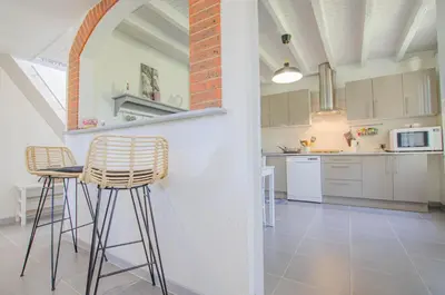 Cuisine ou kitchenette dans l'établissement Le prieure