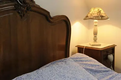 Un ou plusieurs lits dans un hébergement de l'établissement Le gite du passage