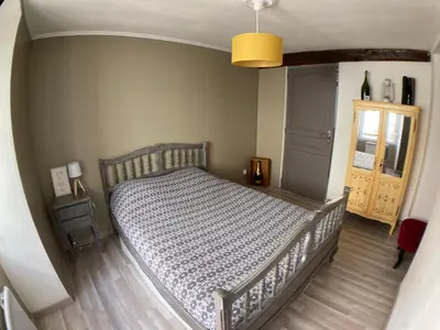Un ou plusieurs lits dans un hébergement de l'établissement La Maison Au 1894 bulles de bonheur et Spa