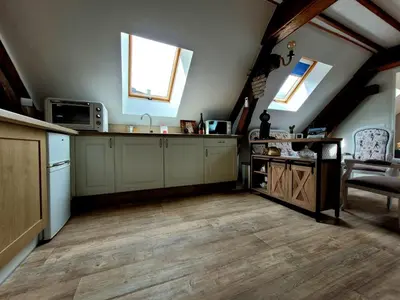 Cuisine ou kitchenette dans l'établissement La Maison Au 1894 bulles de bonheur et Spa