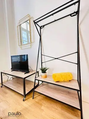 Télévision ou salle de divertissement dans l'établissement Studio chaleureux