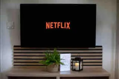Télévision ou salle de divertissement dans l'établissement La Suite 7 Gîte Urbain