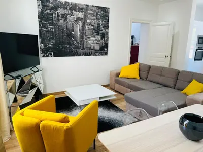 Coin salon dans l'établissement COSY T3 Centre Reims/Pkg Privé