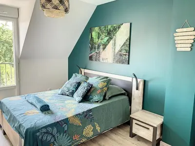 Un ou plusieurs lits dans un hébergement de l'établissement Chambre Evasion - SDB WC Privatif - Entrée autonome - Grande TV NETFLIX
