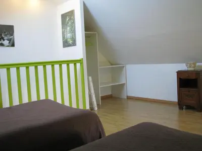 Un ou plusieurs lits dans un hébergement de l'établissement Le chateau