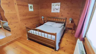 Un ou plusieurs lits dans un hébergement de l'établissement Le chalet du mazagran