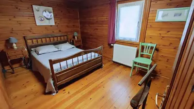 Un ou plusieurs lits dans un hébergement de l'établissement Le chalet du mazagran