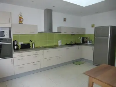 Cuisine ou kitchenette dans l'établissement La grange