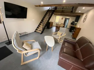 Télévision ou salle de divertissement dans l'établissement Gite de la semoy