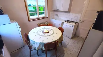 Cuisine ou kitchenette dans l'établissement Une pause a la campagne