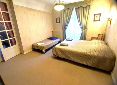 Un ou plusieurs lits dans un hébergement de l'établissement Chez anne