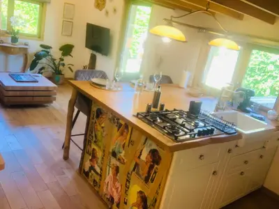 Cuisine ou kitchenette dans l'établissement Chalet La Bohème