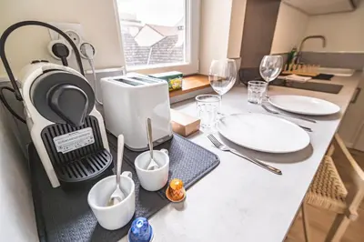 Cuisine ou kitchenette dans l'établissement Le Sérénité - Studio Cocon à deux pas de la gare