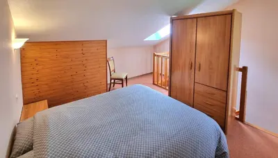 Un ou plusieurs lits dans un hébergement de l'établissement Auberge de la Forêt