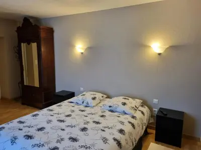 Un ou plusieurs lits dans un hébergement de l'établissement Auberge de la Forêt