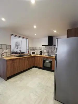 Cuisine ou kitchenette dans l'établissement Gîte des quatre saisons