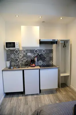 Cuisine ou kitchenette dans l'établissement Mars