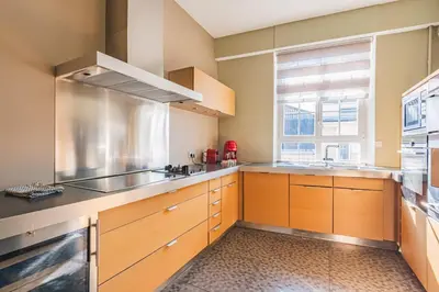 Cuisine ou kitchenette dans l'établissement Hyper center Sauna air conditionner