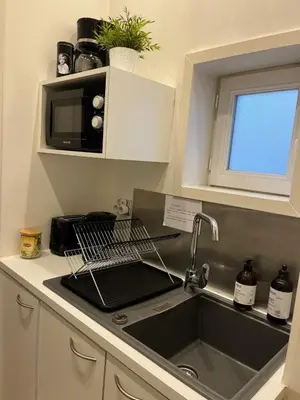 Cuisine ou kitchenette dans l'établissement Le Bacchus - hypercentre de Reims