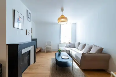 Coin salon dans l'établissement Appartement Meuse & Mono, en hyper centre