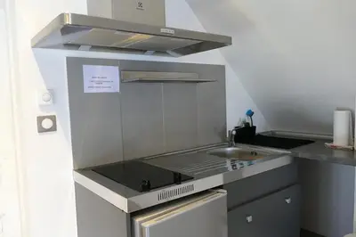 Cuisine ou kitchenette dans l'établissement Le Cosy de Roseline