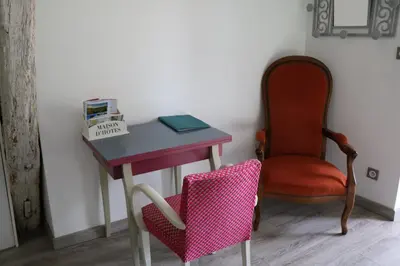 Coin salon dans l'établissement Le Cosy de Roseline