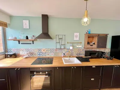 Cuisine ou kitchenette dans l'établissement DOM' - Proche Arena Boulingrin