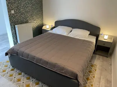 Un ou plusieurs lits dans un hébergement de l'établissement Les berges du canal, maison avec Jacuzzi
