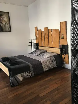 Un ou plusieurs lits dans un hébergement de l'établissement Chez Franck et Sandra , plein centre ville, 1 er étage