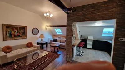 Télévision ou salle de divertissement dans l'établissement La Cigogne