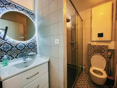 Salle de bains dans l'établissement Le Rossignol