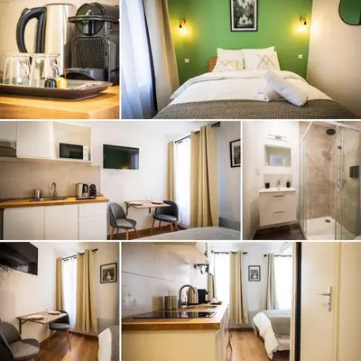 Cuisine ou kitchenette dans l'établissement L'Albatros 002 - Hypercentre * Cosy * Wifi
