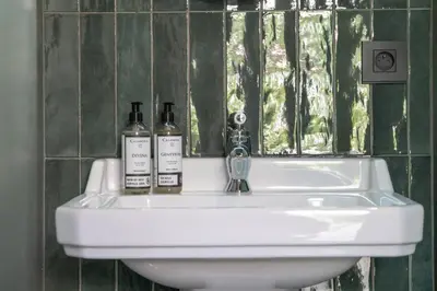 Salle de bains dans l'établissement Maison Heronnière