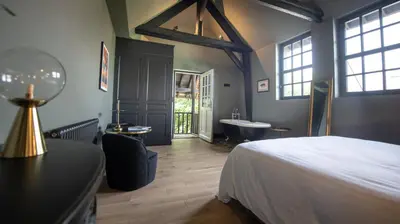 Un ou plusieurs lits dans un hébergement de l'établissement Maison Heronnière