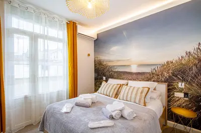 Un ou plusieurs lits dans un hébergement de l'établissement Soleil d'Été - Netflix & Wifi - Balcon - Climatisation - Parking Gratuit - check-in 24H24 - Emplacement Vélos - GoodMarning