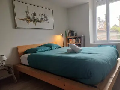 Un ou plusieurs lits dans un hébergement de l'établissement Le grenier à sel, Chaleureux 2 Chambres-Centre-Gare