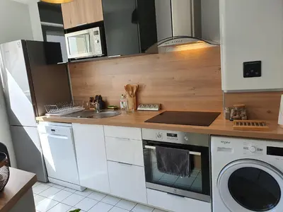 Cuisine ou kitchenette dans l'établissement Magnifique appartement avec garage privé et terrasse
