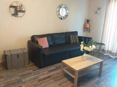 Coin salon dans l'établissement Le Saphir - Appartement et terrasse